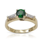 Emerald engagement ring with taper diamonds