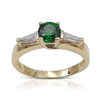 Emerald engagement ring with taper diamonds